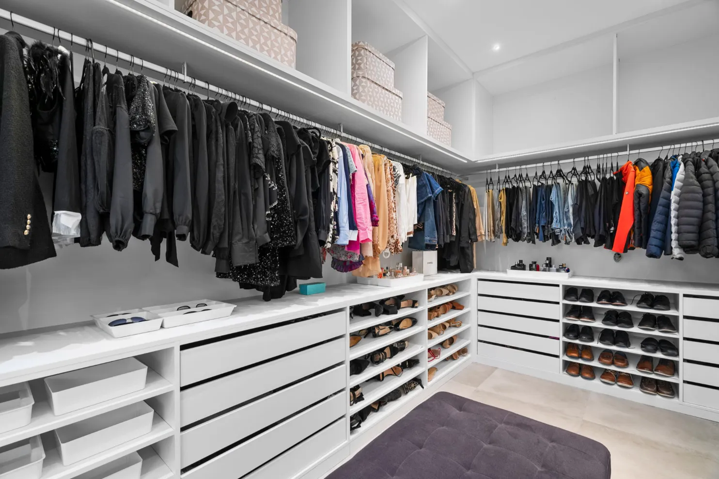 A walk-in closet built and installed by Click Closets